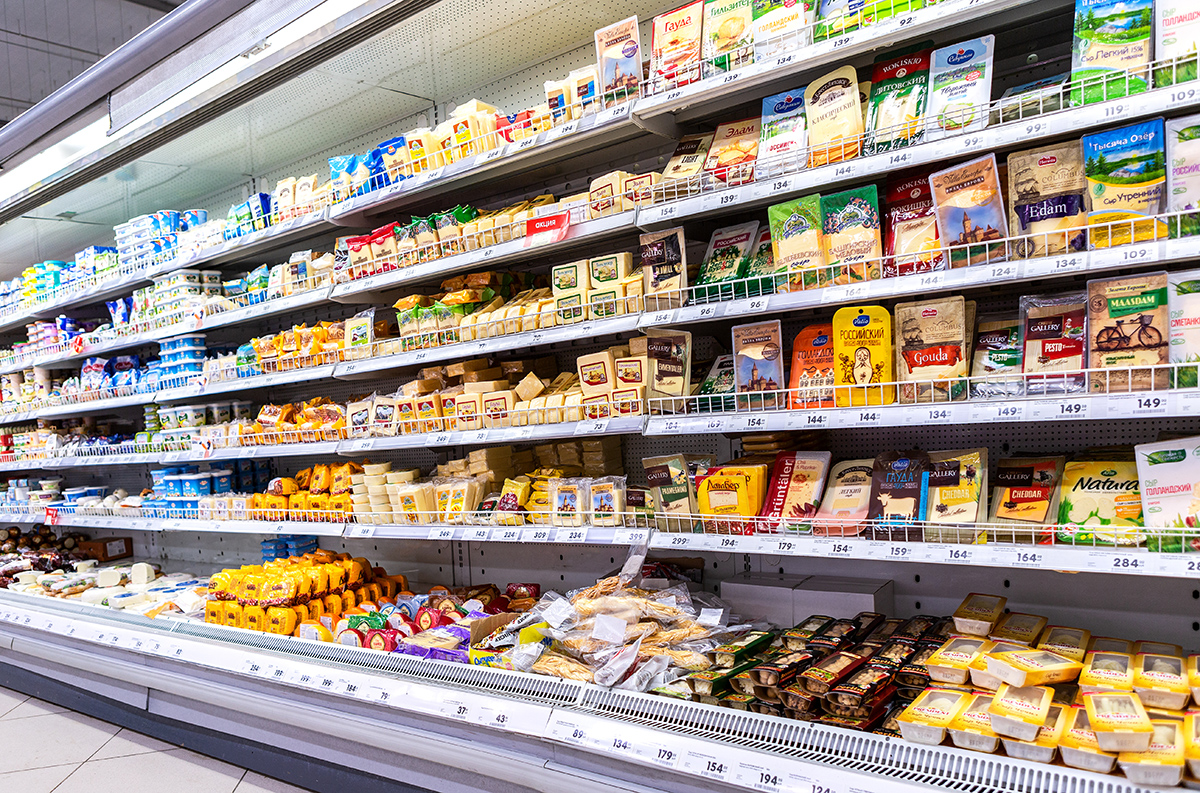 Various packaged cheese for sale on the superstore shelves