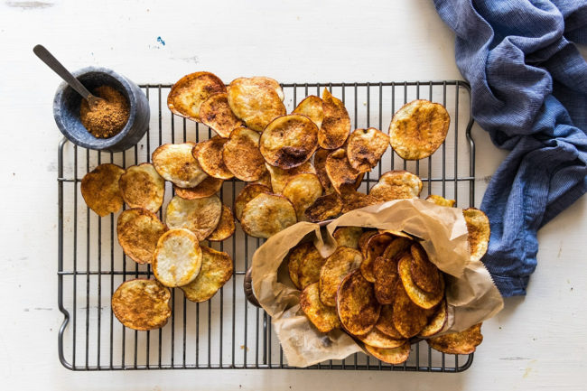 Delightfully crispy Baked Potato Chips...savory, satisfying, and healthier with Idaho potatoes, seasoned to perfection for guilt-free snacking!