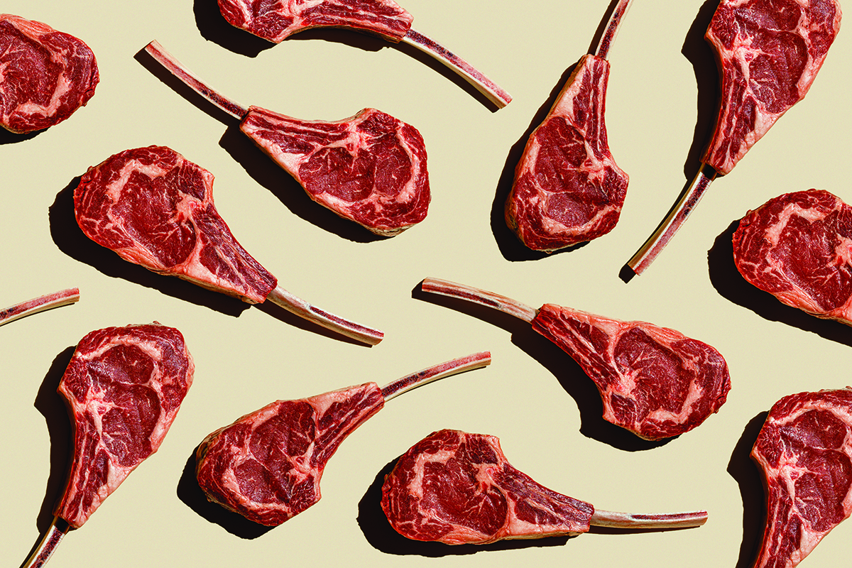 Pattern of Raw fresh meat Tomahawk Steak on beige background flatlay food